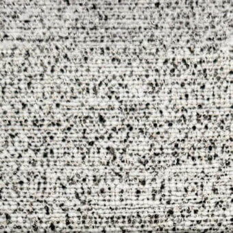 Light gray ribbed fabric texture with speckled pattern, displaying a dense woven construction and slight surface roughness; egoitaliano grease 004.